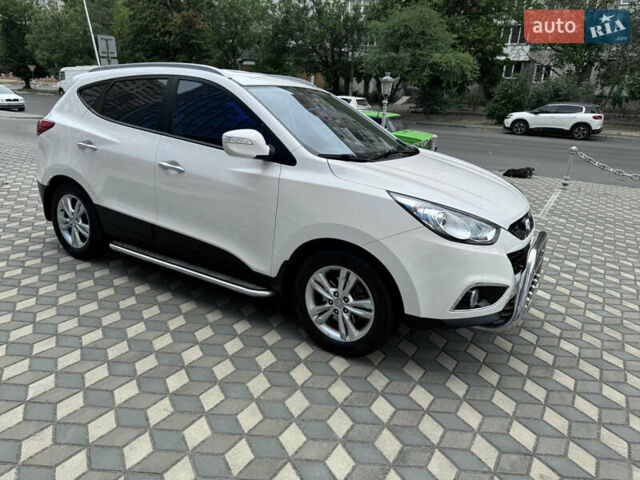 Білий Хендай іх35, об'ємом двигуна 2 л та пробігом 101 тис. км за 14300 $, фото 25 на Automoto.ua