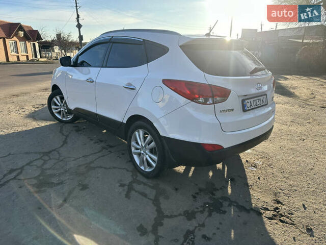Білий Хендай іх35, об'ємом двигуна 2 л та пробігом 220 тис. км за 12600 $, фото 3 на Automoto.ua