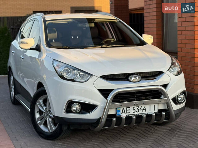 Білий Хендай іх35, об'ємом двигуна 2 л та пробігом 101 тис. км за 13800 $, фото 21 на Automoto.ua