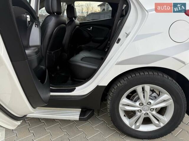 Білий Хендай іх35, об'ємом двигуна 2 л та пробігом 133 тис. км за 9600 $, фото 32 на Automoto.ua