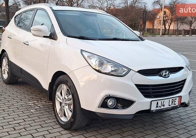 Білий Хендай іх35, об'ємом двигуна 2 л та пробігом 208 тис. км за 13999 $, фото 37 на Automoto.ua