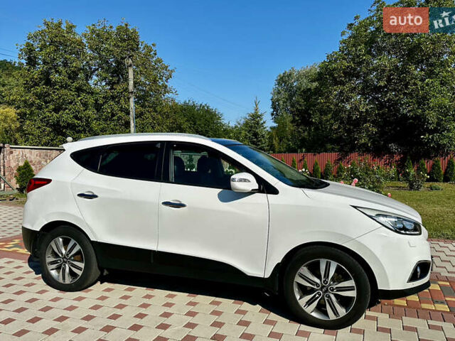 Білий Хендай іх35, об'ємом двигуна 2 л та пробігом 144 тис. км за 16000 $, фото 1 на Automoto.ua