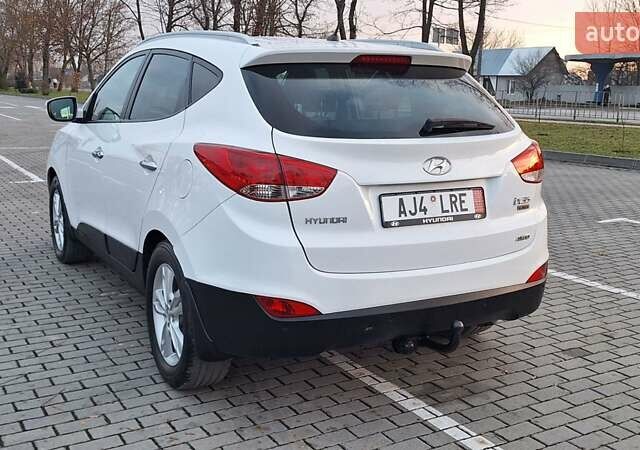 Білий Хендай іх35, об'ємом двигуна 2 л та пробігом 208 тис. км за 13999 $, фото 44 на Automoto.ua