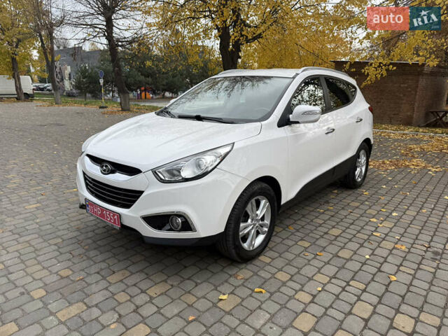 Білий Хендай іх35, об'ємом двигуна 2 л та пробігом 180 тис. км за 16300 $, фото 5 на Automoto.ua