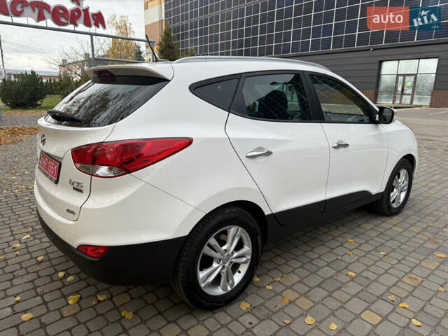 Білий Хендай іх35, об'ємом двигуна 2 л та пробігом 180 тис. км за 16300 $, фото 19 на Automoto.ua