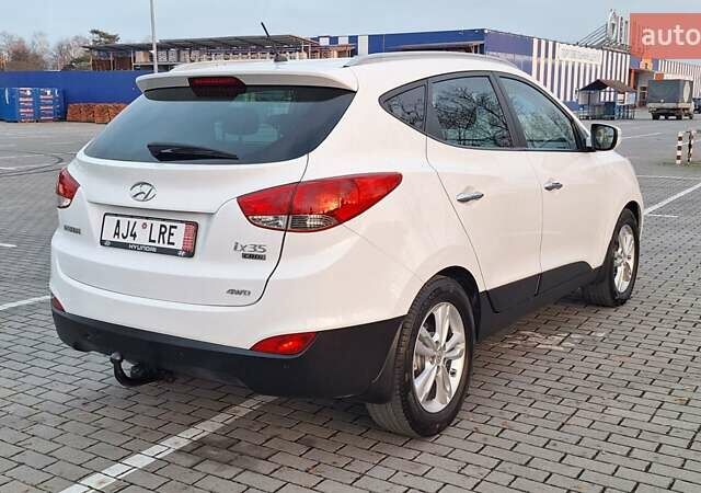 Білий Хендай іх35, об'ємом двигуна 2 л та пробігом 208 тис. км за 13999 $, фото 41 на Automoto.ua