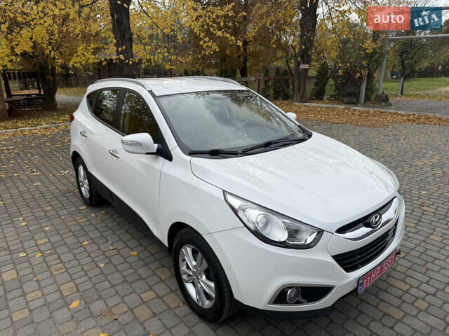 Білий Хендай іх35, об'ємом двигуна 2 л та пробігом 180 тис. км за 16300 $, фото 14 на Automoto.ua