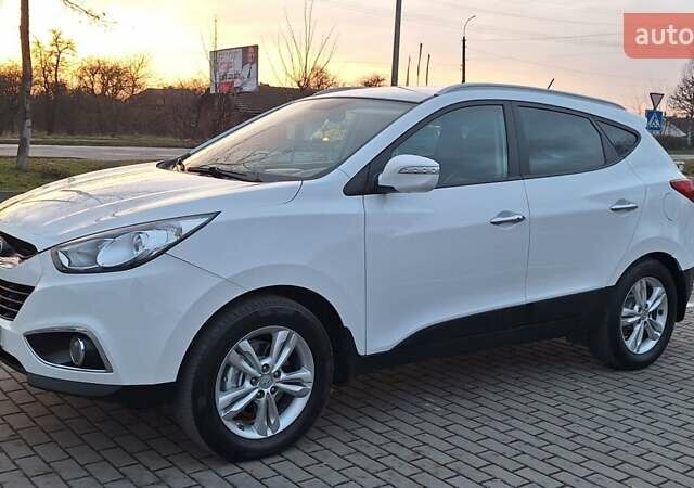 Білий Хендай іх35, об'ємом двигуна 2 л та пробігом 208 тис. км за 13999 $, фото 48 на Automoto.ua