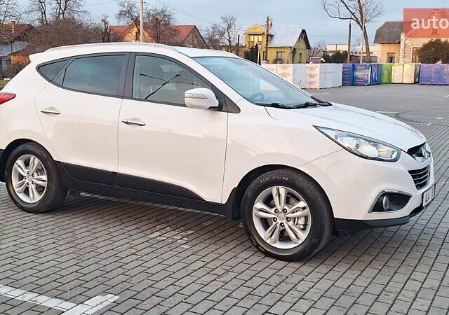 Білий Хендай іх35, об'ємом двигуна 2 л та пробігом 208 тис. км за 13999 $, фото 39 на Automoto.ua