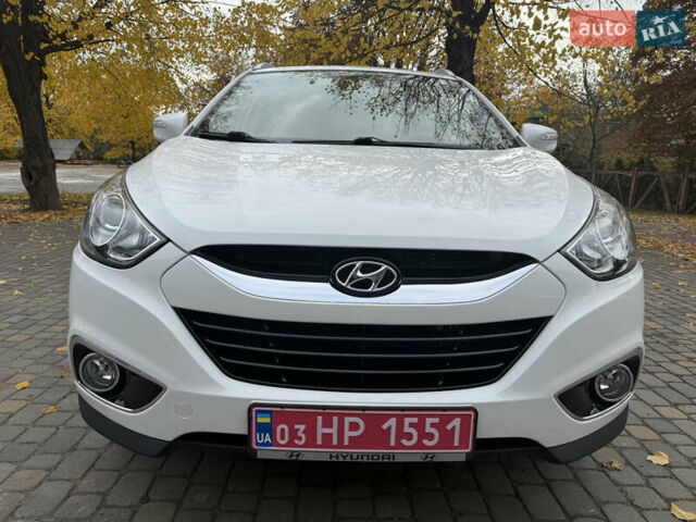 Білий Хендай іх35, об'ємом двигуна 2 л та пробігом 180 тис. км за 16300 $, фото 10 на Automoto.ua