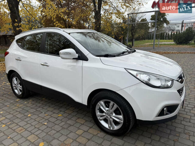 Білий Хендай іх35, об'ємом двигуна 2 л та пробігом 180 тис. км за 16300 $, фото 17 на Automoto.ua