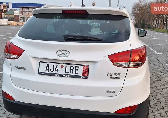 Білий Хендай іх35, об'ємом двигуна 2 л та пробігом 208 тис. км за 13999 $, фото 43 на Automoto.ua