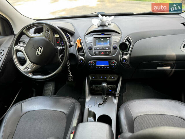 Білий Хендай іх35, об'ємом двигуна 2 л та пробігом 238 тис. км за 14900 $, фото 9 на Automoto.ua