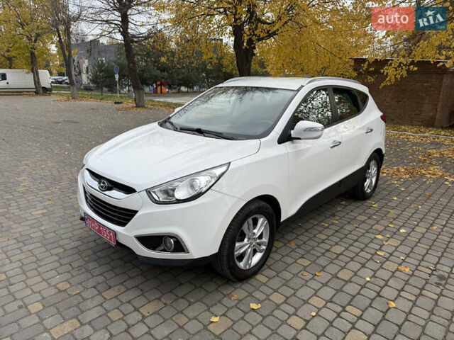 Білий Хендай іх35, об'ємом двигуна 2 л та пробігом 180 тис. км за 16300 $, фото 6 на Automoto.ua