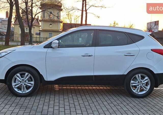 Білий Хендай іх35, об'ємом двигуна 2 л та пробігом 208 тис. км за 13999 $, фото 46 на Automoto.ua