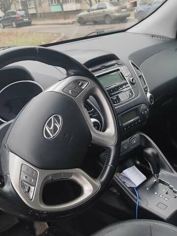 Білий Хендай іх35, об'ємом двигуна 2 л та пробігом 138 тис. км за 13500 $, фото 12 на Automoto.ua