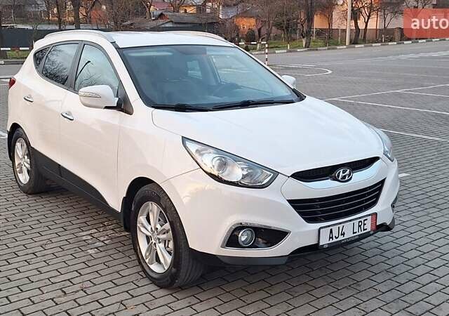 Білий Хендай іх35, об'ємом двигуна 2 л та пробігом 208 тис. км за 13999 $, фото 38 на Automoto.ua