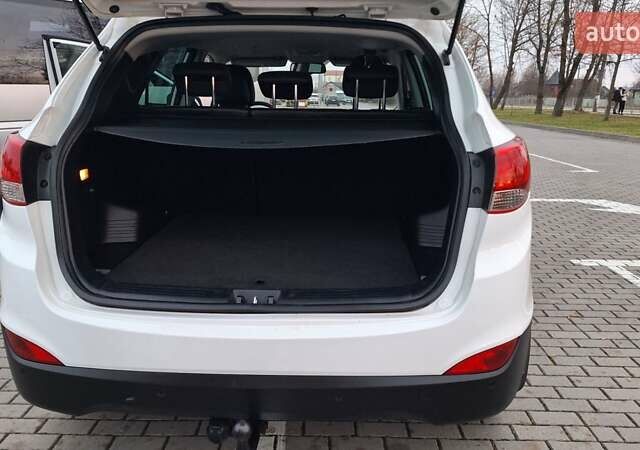 Білий Хендай іх35, об'ємом двигуна 2 л та пробігом 208 тис. км за 13999 $, фото 11 на Automoto.ua