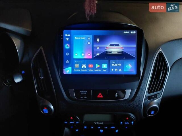 Білий Хендай іх35, об'ємом двигуна 1.69 л та пробігом 218 тис. км за 13800 $, фото 8 на Automoto.ua