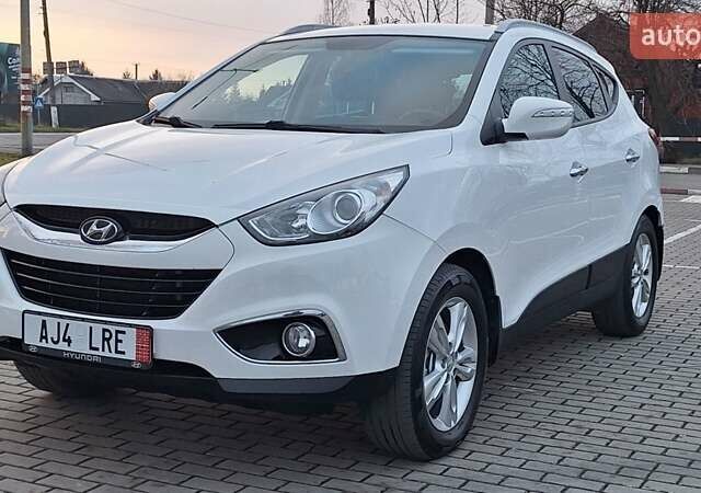 Білий Хендай іх35, об'ємом двигуна 2 л та пробігом 208 тис. км за 13999 $, фото 5 на Automoto.ua