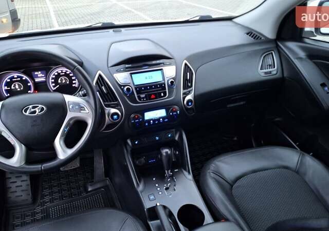 Білий Хендай іх35, об'ємом двигуна 2 л та пробігом 208 тис. км за 13999 $, фото 28 на Automoto.ua