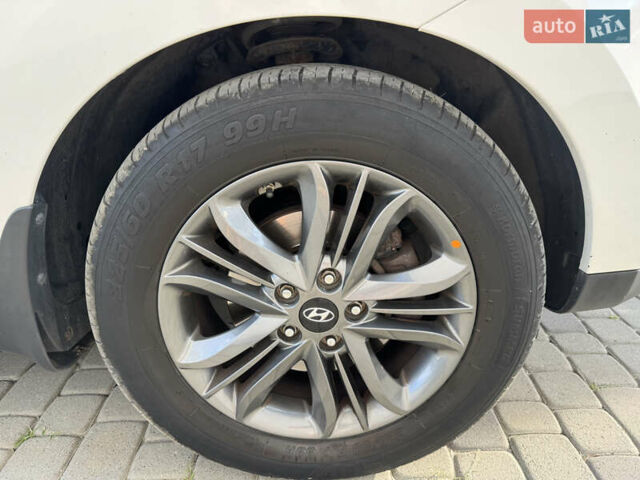 Білий Хендай іх35, об'ємом двигуна 2 л та пробігом 238 тис. км за 14900 $, фото 12 на Automoto.ua