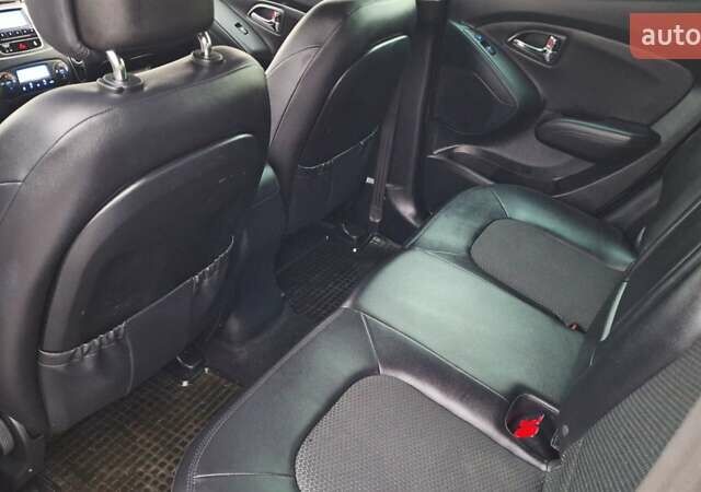 Білий Хендай іх35, об'ємом двигуна 2 л та пробігом 208 тис. км за 13999 $, фото 29 на Automoto.ua