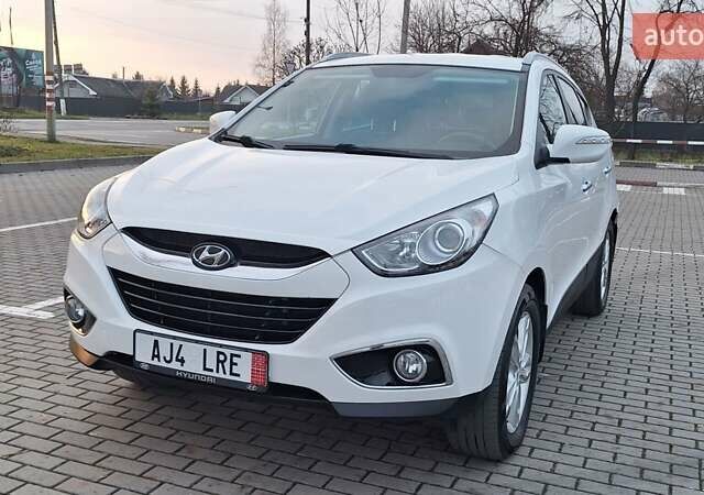 Білий Хендай іх35, об'ємом двигуна 2 л та пробігом 208 тис. км за 13999 $, фото 51 на Automoto.ua