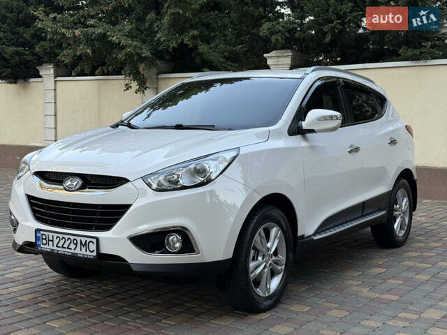 Белый Хендай их35, объемом двигателя 2 л и пробегом 85 тыс. км за 15999 $, фото 24 на Automoto.ua