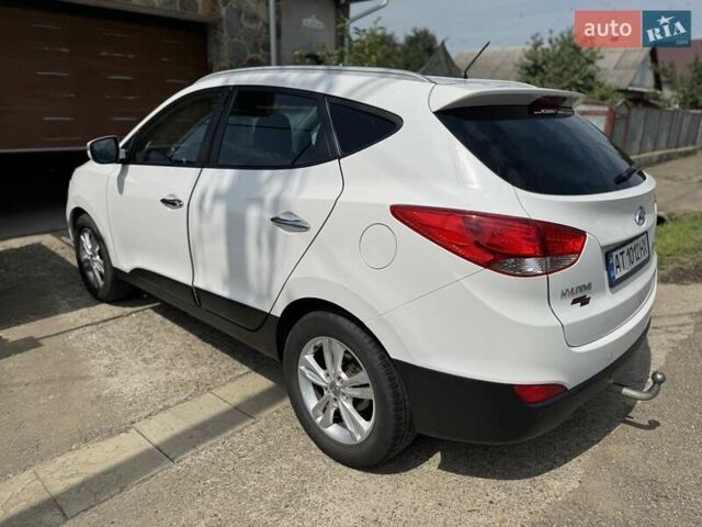 Білий Хендай іх35, об'ємом двигуна 1.7 л та пробігом 205 тис. км за 12500 $, фото 3 на Automoto.ua