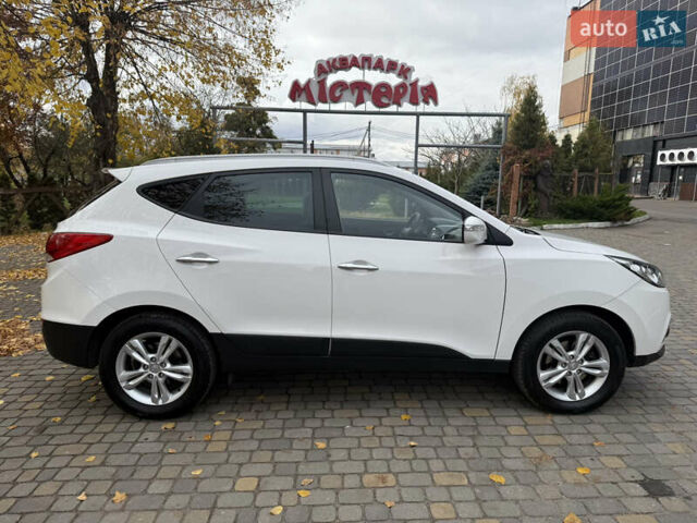 Білий Хендай іх35, об'ємом двигуна 2 л та пробігом 180 тис. км за 16300 $, фото 18 на Automoto.ua