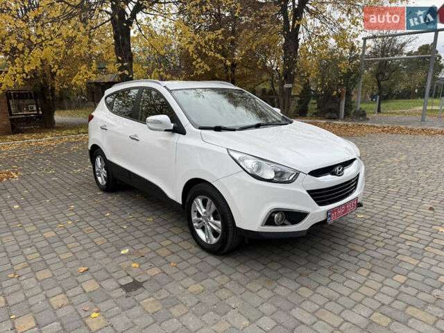 Білий Хендай іх35, об'ємом двигуна 2 л та пробігом 180 тис. км за 16300 $, фото 7 на Automoto.ua