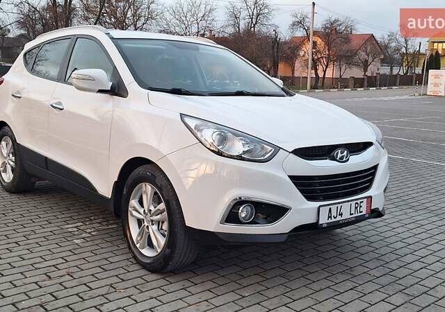 Білий Хендай іх35, об'ємом двигуна 2 л та пробігом 208 тис. км за 13999 $, фото 9 на Automoto.ua