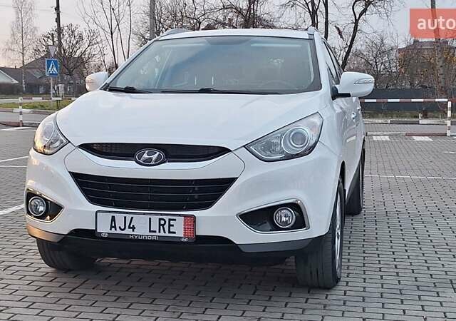 Білий Хендай іх35, об'ємом двигуна 2 л та пробігом 208 тис. км за 13999 $, фото 10 на Automoto.ua