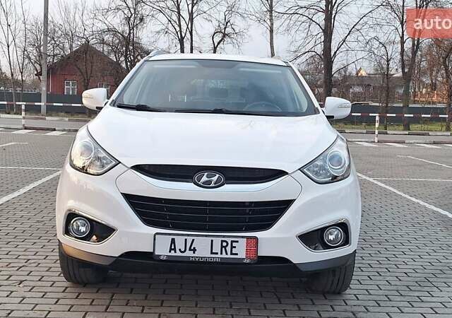 Білий Хендай іх35, об'ємом двигуна 2 л та пробігом 208 тис. км за 13999 $, фото 36 на Automoto.ua