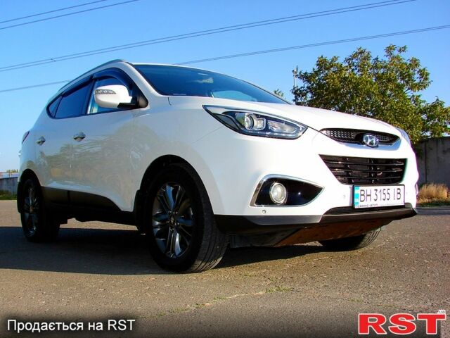 Білий Хендай іх35, об'ємом двигуна 2 л та пробігом 128 тис. км за 16000 $, фото 1 на Automoto.ua