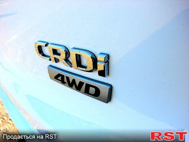 Білий Хендай іх35, об'ємом двигуна 2 л та пробігом 128 тис. км за 16000 $, фото 4 на Automoto.ua