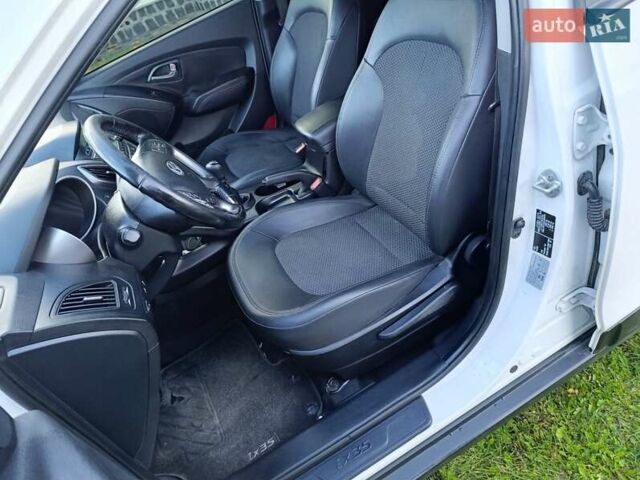 Білий Хендай іх35, об'ємом двигуна 1.69 л та пробігом 161 тис. км за 14200 $, фото 11 на Automoto.ua