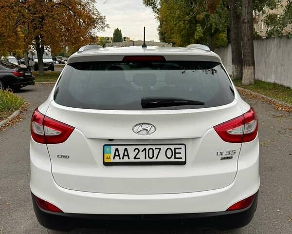 Білий Хендай іх35, об'ємом двигуна 2 л та пробігом 108 тис. км за 15888 $, фото 8 на Automoto.ua