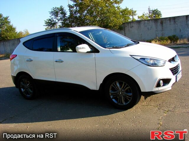 Білий Хендай іх35, об'ємом двигуна 2 л та пробігом 128 тис. км за 16000 $, фото 2 на Automoto.ua