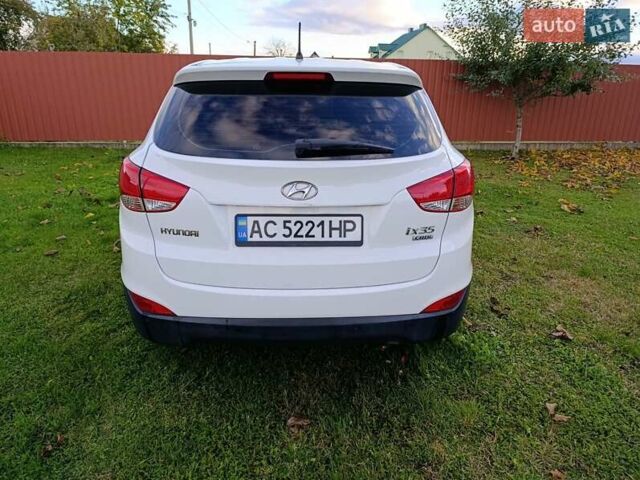 Білий Хендай іх35, об'ємом двигуна 1.69 л та пробігом 161 тис. км за 14200 $, фото 9 на Automoto.ua