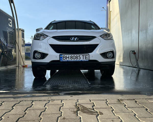 Білий Хендай іх35, об'ємом двигуна 2 л та пробігом 159 тис. км за 16500 $, фото 21 на Automoto.ua