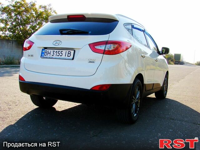 Білий Хендай іх35, об'ємом двигуна 2 л та пробігом 128 тис. км за 16000 $, фото 3 на Automoto.ua
