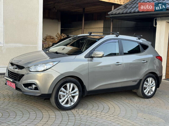 Бежевый Хендай их35, объемом двигателя 2 л и пробегом 147 тыс. км за 11800 $, фото 26 на Automoto.ua