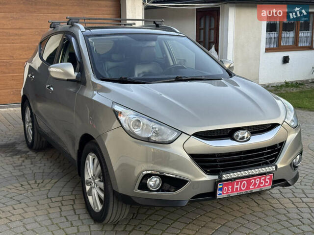 Бежевый Хендай их35, объемом двигателя 2 л и пробегом 147 тыс. км за 11800 $, фото 23 на Automoto.ua