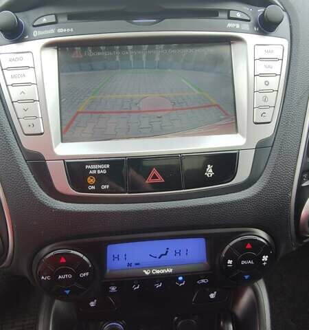 Бежевый Хендай их35, объемом двигателя 2 л и пробегом 200 тыс. км за 10990 $, фото 22 на Automoto.ua