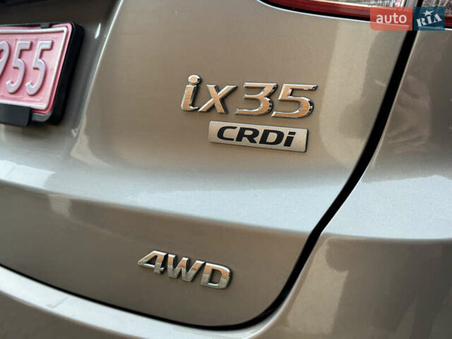 Бежевый Хендай их35, объемом двигателя 2 л и пробегом 147 тыс. км за 11800 $, фото 38 на Automoto.ua