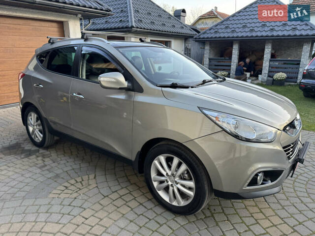 Бежевый Хендай их35, объемом двигателя 2 л и пробегом 147 тыс. км за 11800 $, фото 33 на Automoto.ua