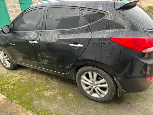 Черный Хендай их35, объемом двигателя 1.7 л и пробегом 205 тыс. км за 12900 $, фото 1 на Automoto.ua