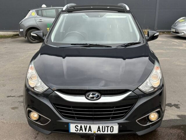 Чорний Хендай іх35, об'ємом двигуна 2 л та пробігом 141 тис. км за 4000 $, фото 1 на Automoto.ua